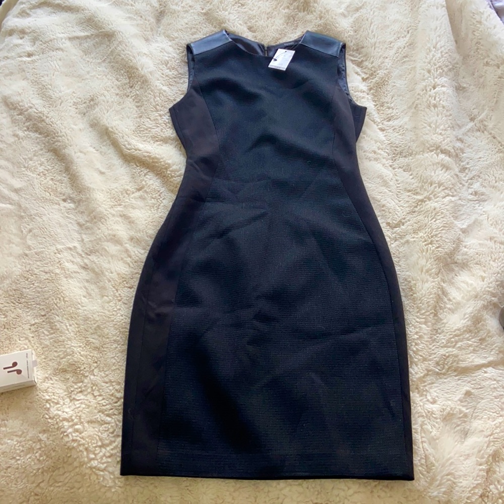 Tahari black dress worth leather (like shoulders)